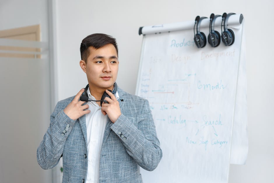 Confident office worker standing by whiteboard with development timeline. Ideal for business themes.